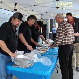 Reliable Automotive staff serving attendees