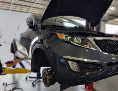 Vehicle being repair on lift