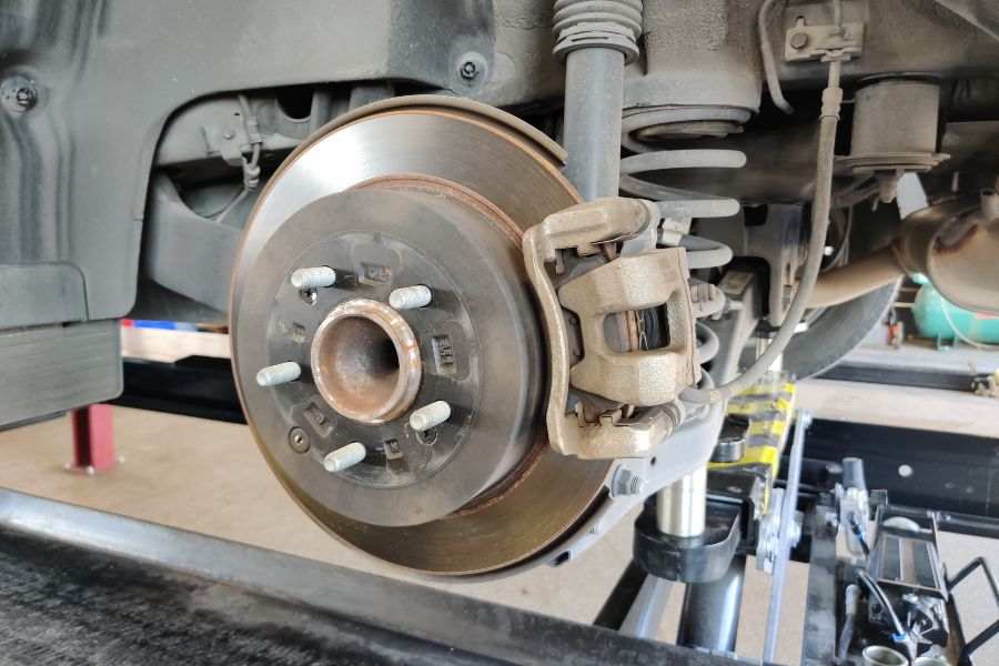 Brakes being serviced during during a brake check in San Marcos TX or brake repair in Buda or Kyle TX