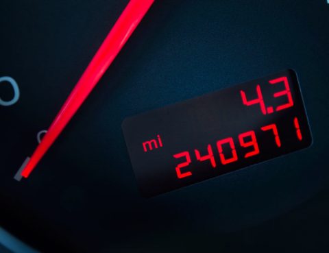 A dashboard odometer showing 240,970 miles