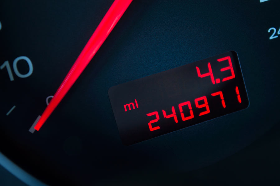 A dashboard odometer showing 240,970 miles